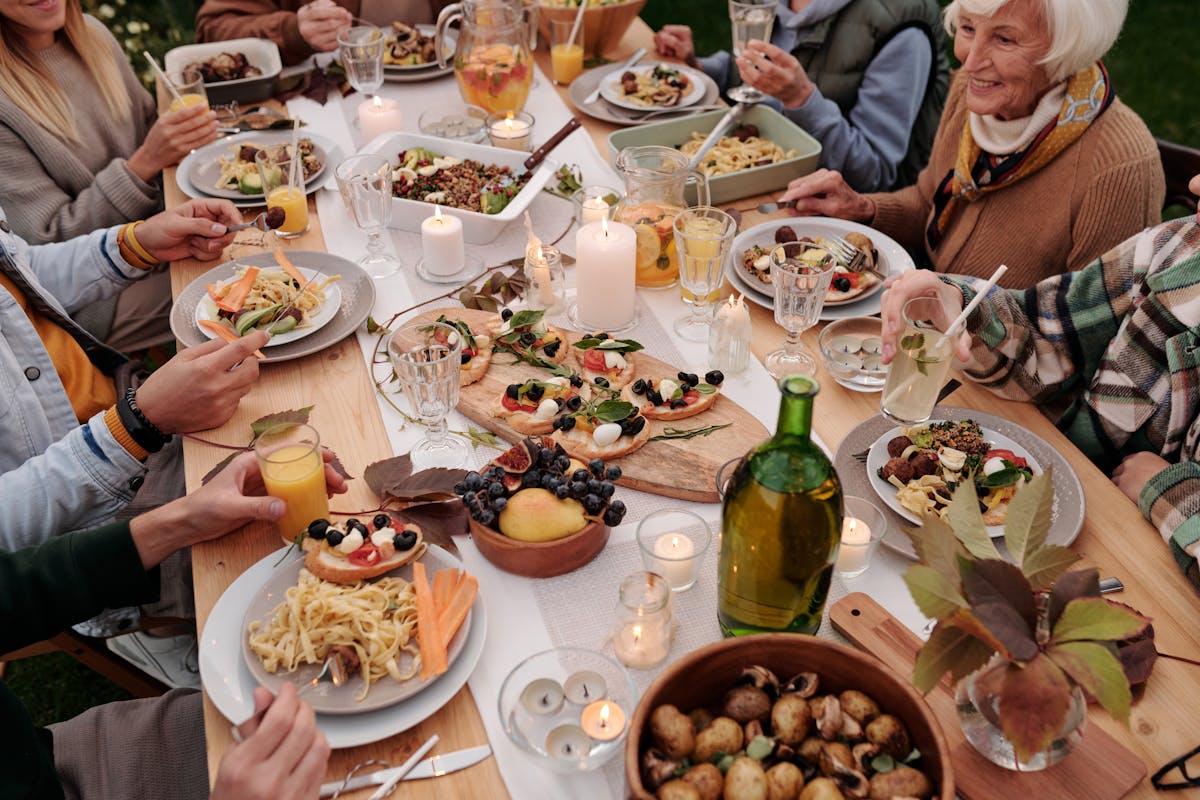A long table set with a catering spread